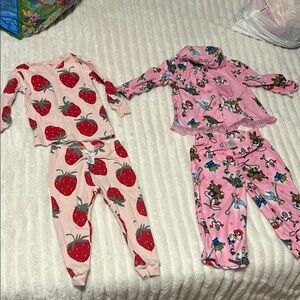 Set of 2 pajama sets. Size is 18 months.